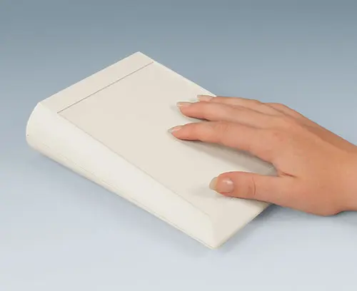 Ergonomic sloping front enclosures