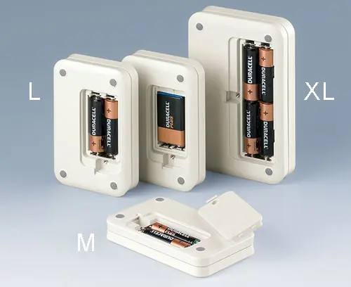 Battery compartment; clip-on battery lid can be screw fixed